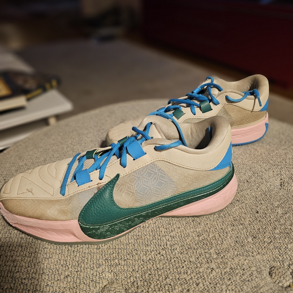 Nike Athletic Shoes with Green and Pink Accents